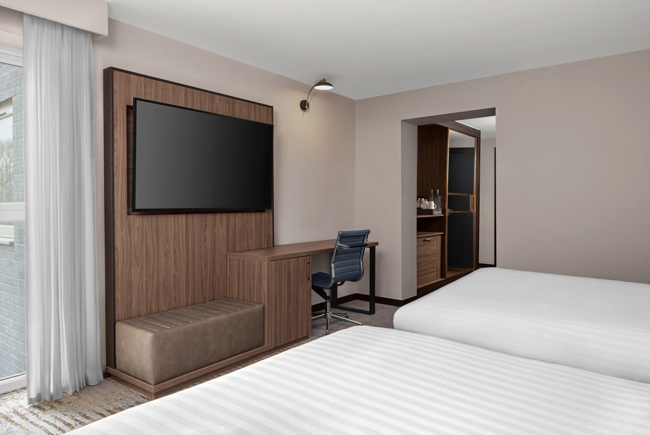 Alternative angle of the double guest room with two double beds