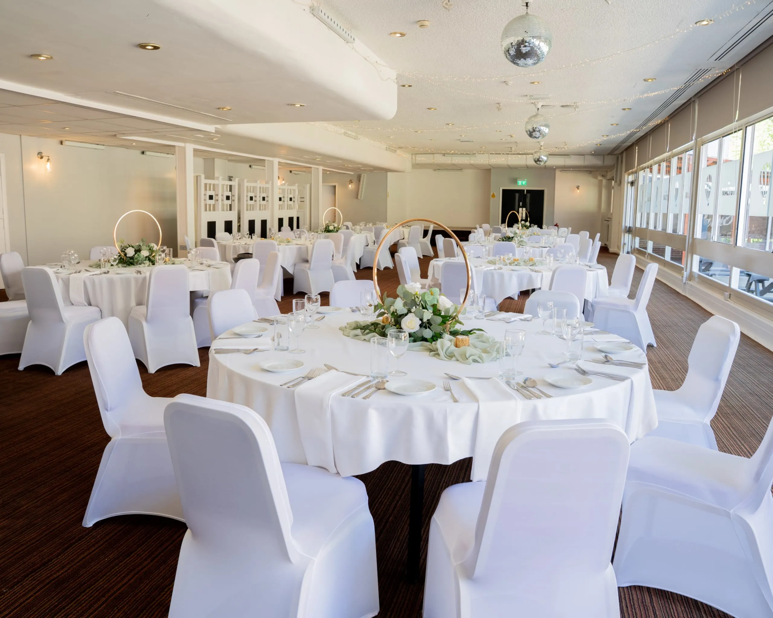 Room view of wedding tables at Sporting Lodge